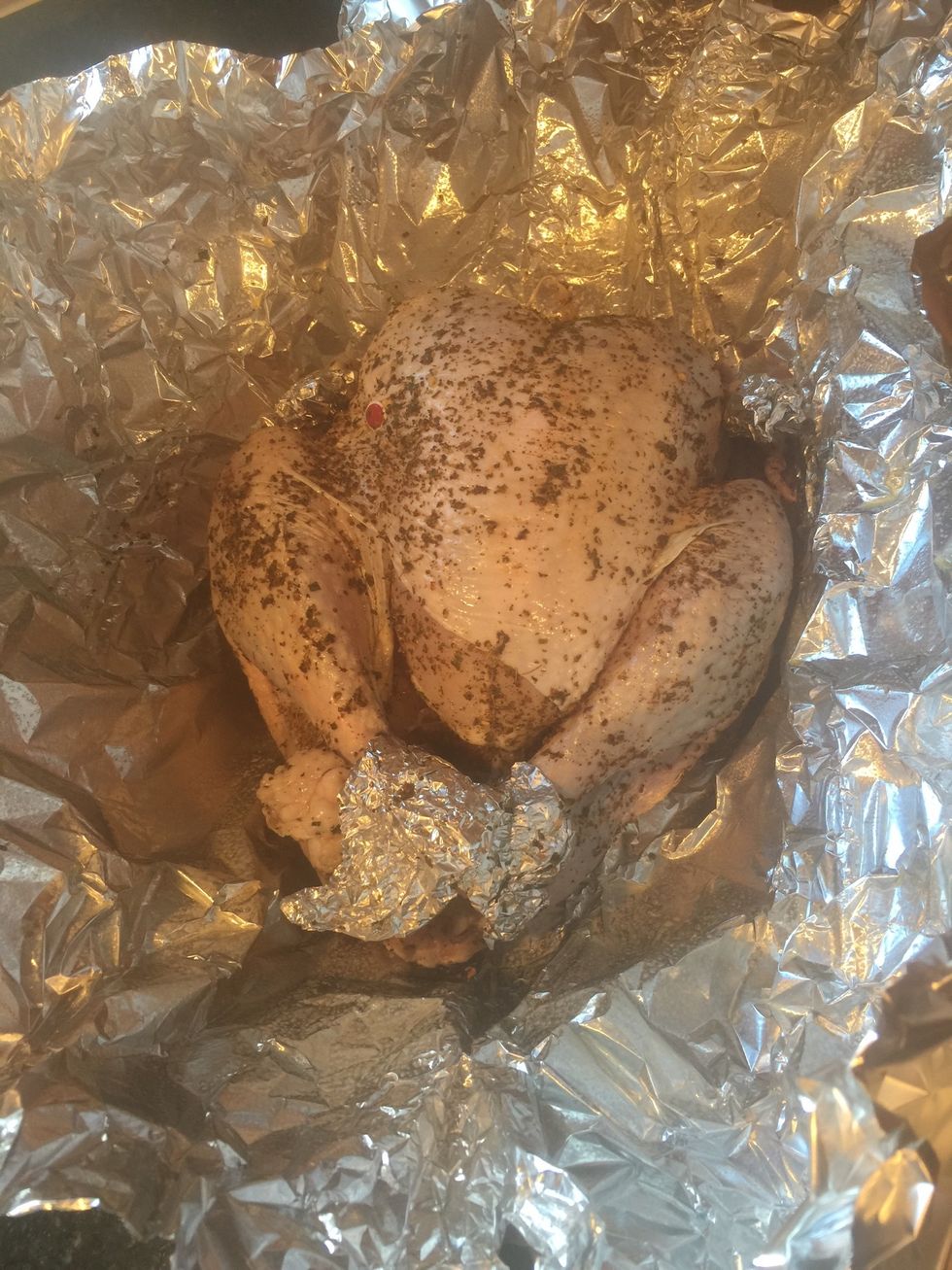 Brush turkey with olive oil or butter and salt the cavity.  Place small pieces of foil over the ends of legs and wing tips to prevent puncturing.