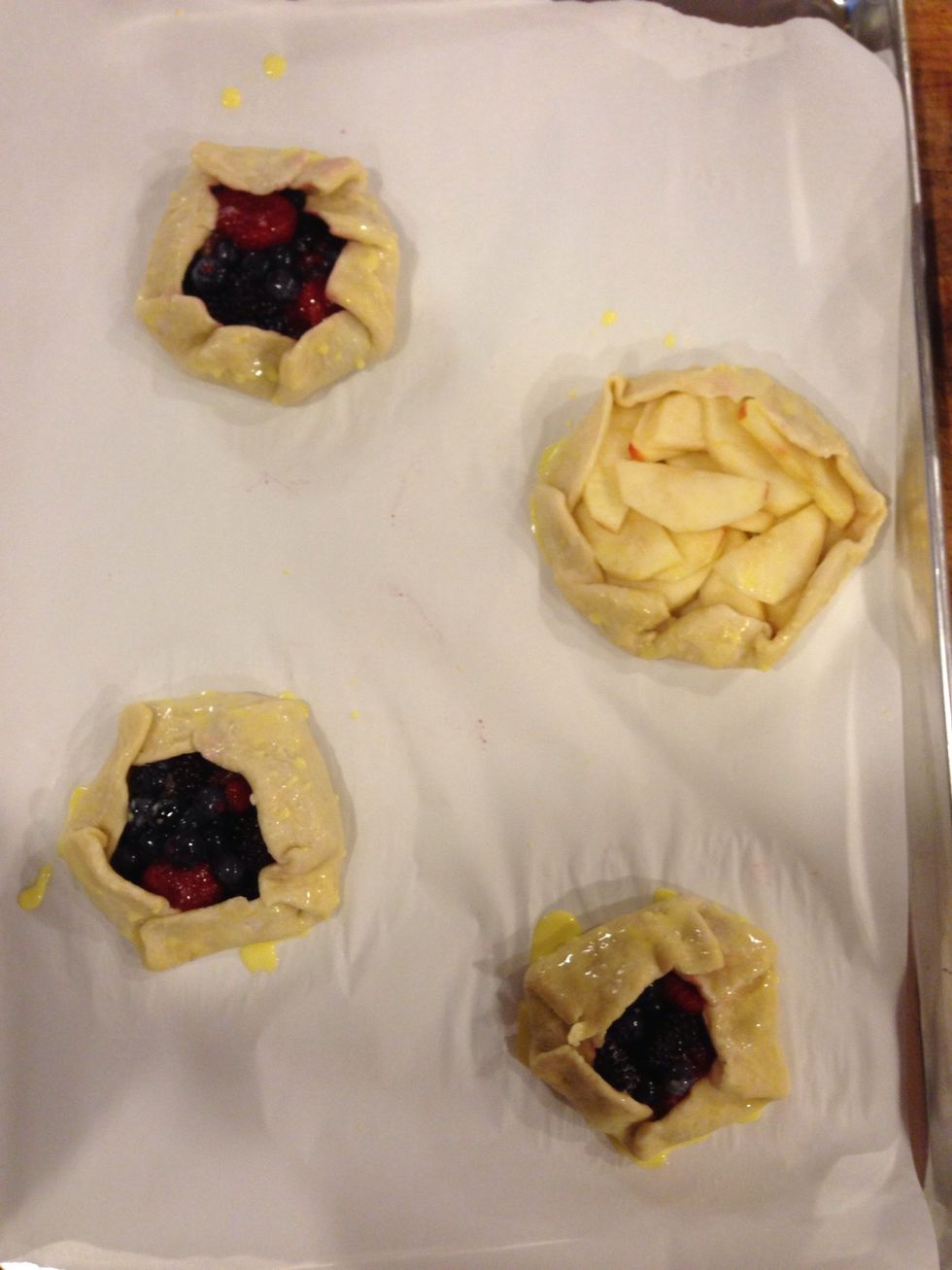 Brush with the egg wash, and sprinkle with sugar. Bake for 30 min, at 350 degrees fahrenheit, until golden brown.