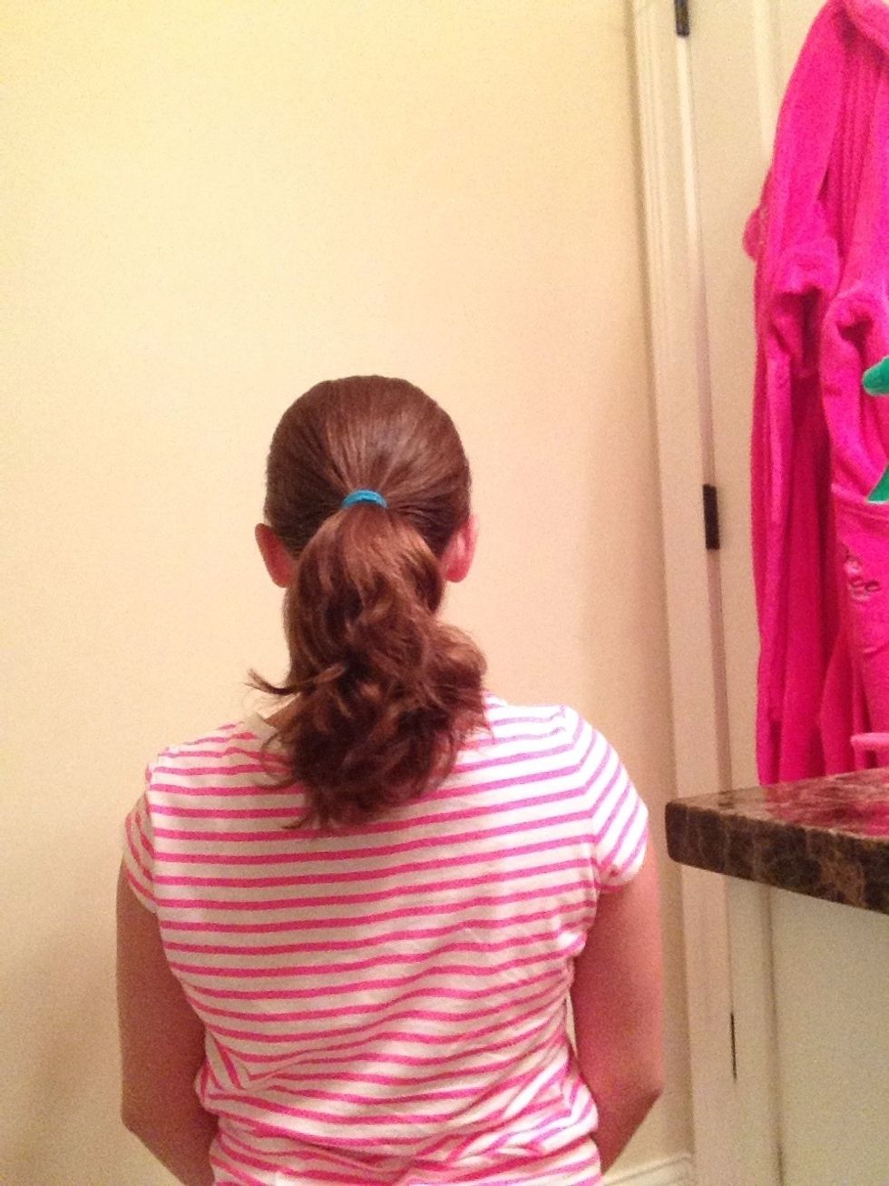 Brush your hair one more time, you want it to be as smooth and detangled as possible.