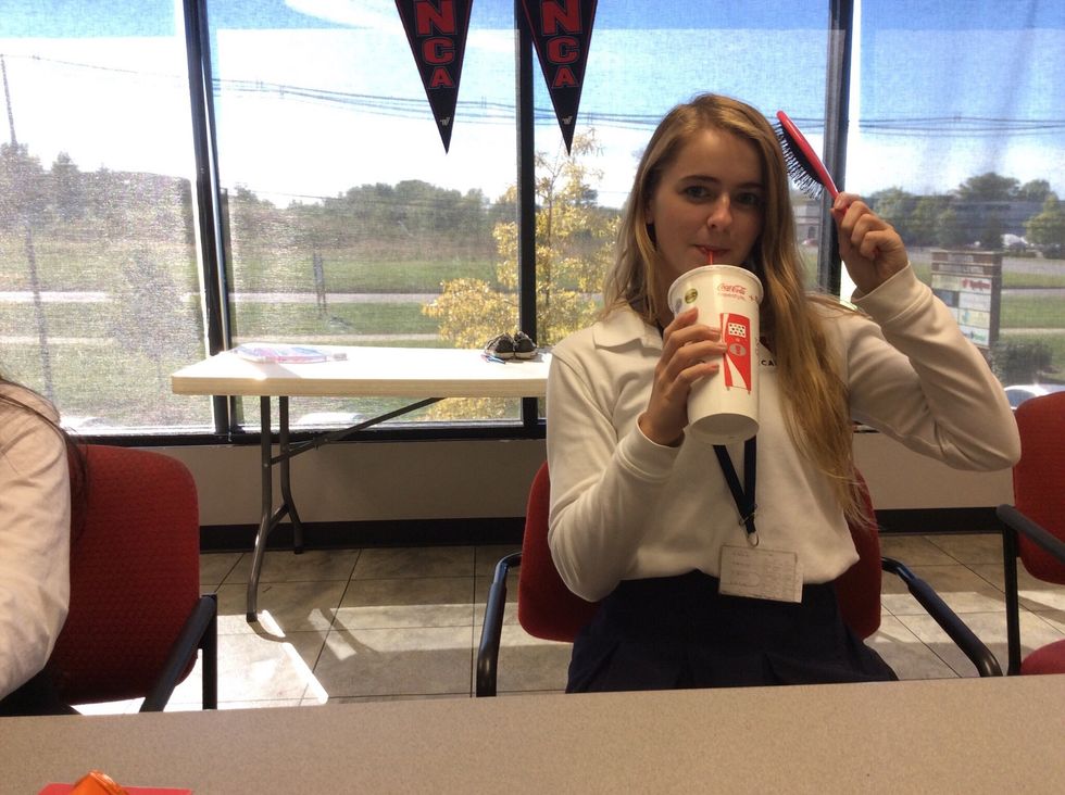 Brush your hair thoroughly and part it on whichever side you want. The braid will be on the side with the most hair.