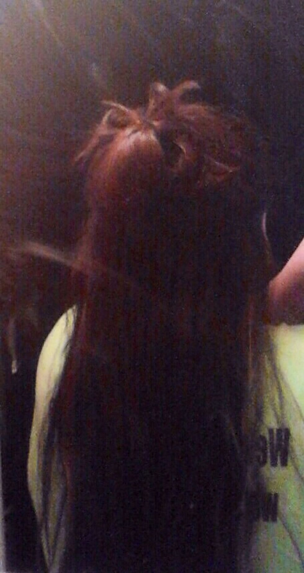 Brush your hair to make sure there are no tangles. While the wand is heating up, separate your hair into two sections, one on top and one on bottom. For more volume, use more sections.