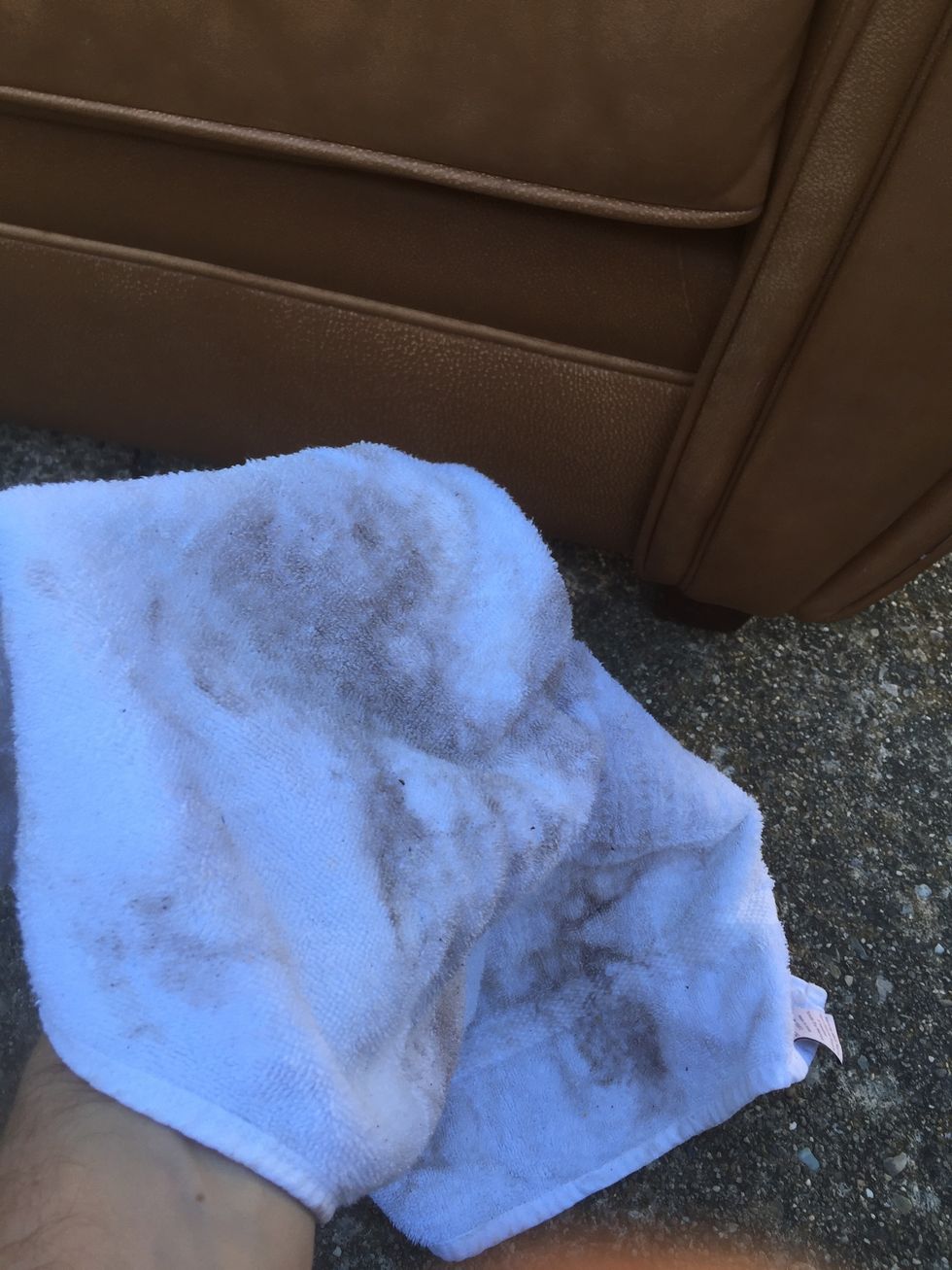 Buff the leather with your Tshirt or Rag. The benefit for using a lot of lotion and then buffing it in is that you'll clean the leather as well. The white rag will let you see you're cleaning.