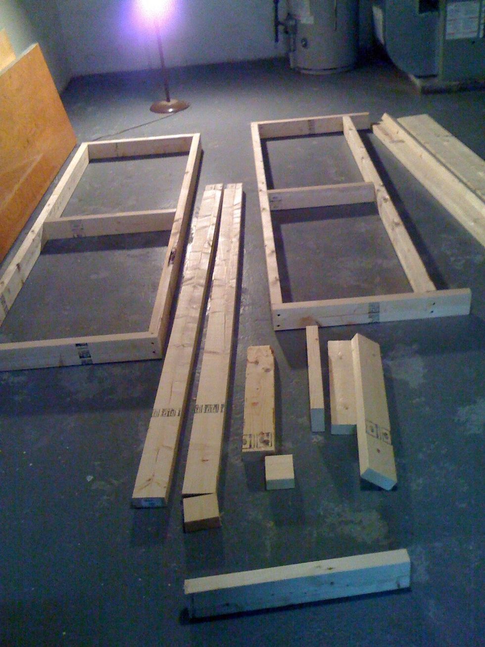 Build 2 frames, (the doors will be attached to the top of the frames.) Bottom shelf will be the same on the sides (30"), but the front 2x4 will be inset (depending on door size) see photo.