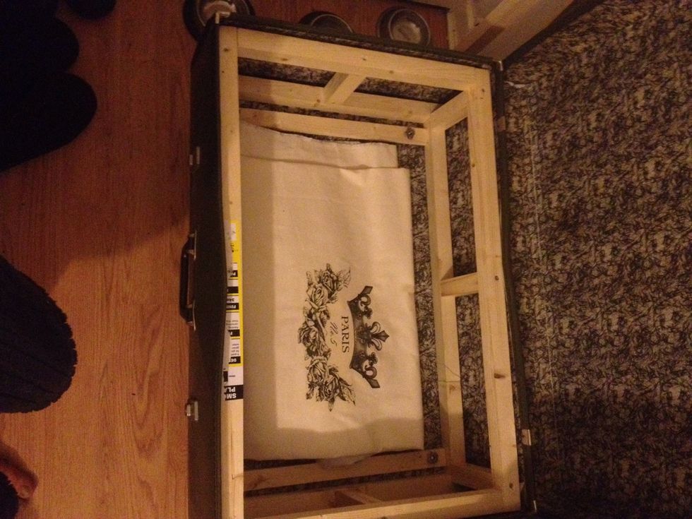 Build a box frame and fix to the lower part of case.  fix legs to wooden frame for strong support .