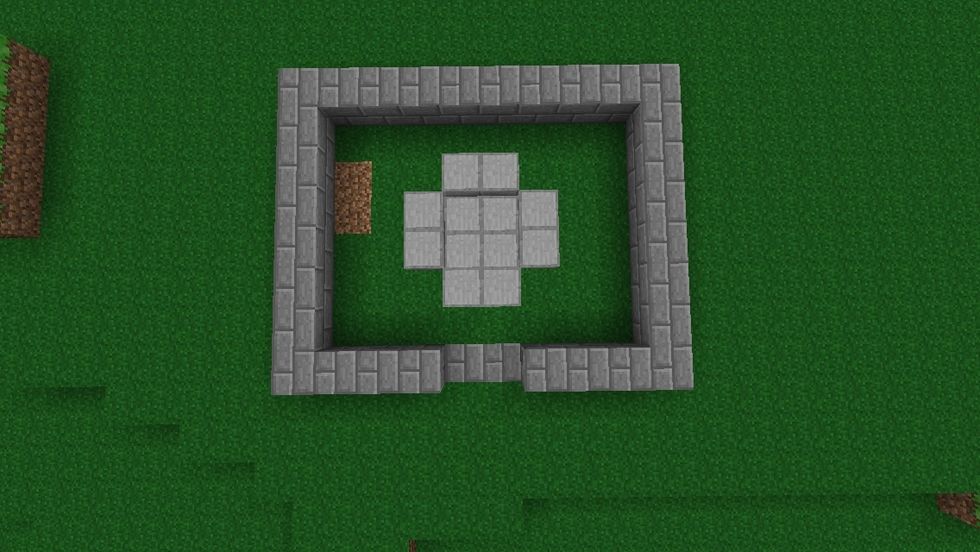 Build an 8x8 border around it but leave space for the door