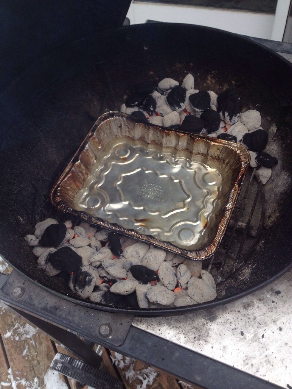 Build charcoal fire in grill, bank coals and place an aluminum lasagna pan 13"x9" in between coals add water to depth of 1".