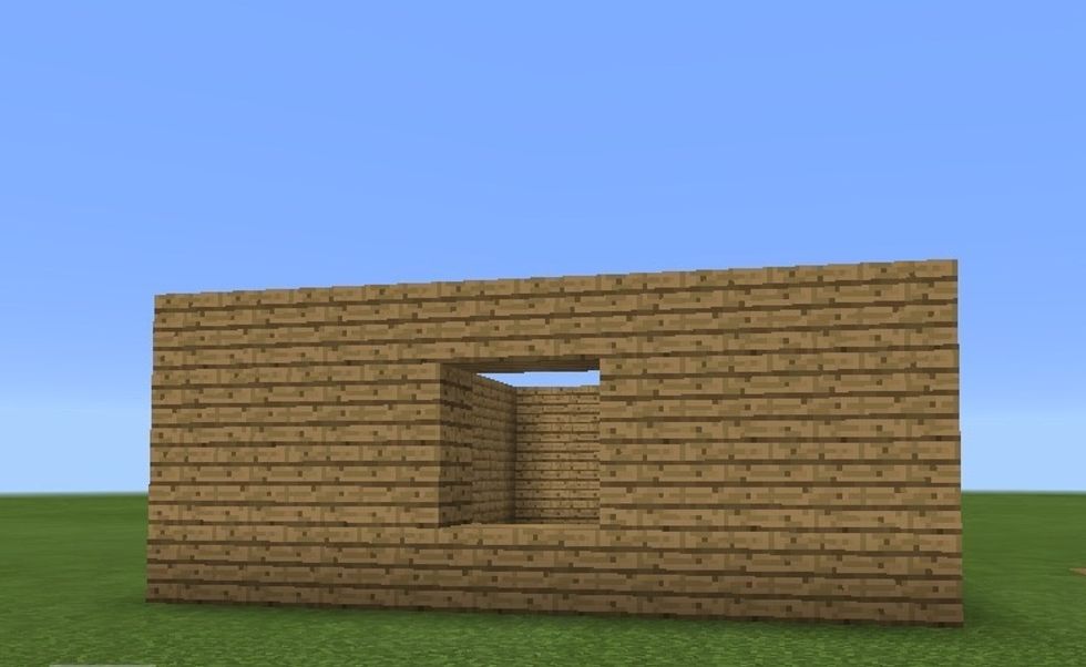 Build the house up another block, this time crossing over the holes.