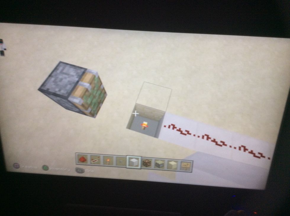 Build this connecting to one of the redstone wires.