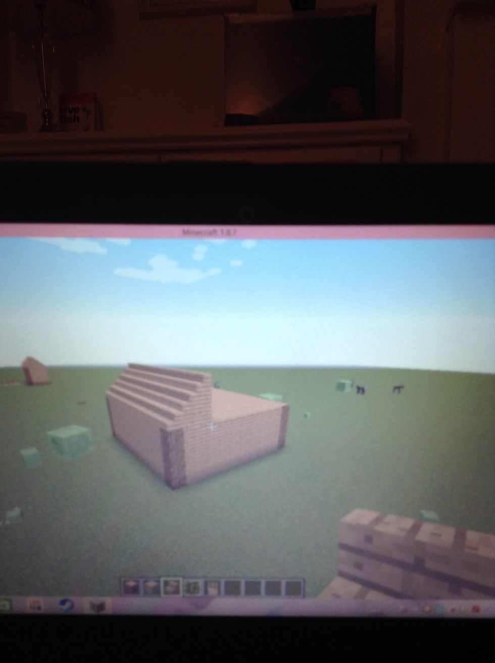 Build up the roof to create a pointy arrow :D