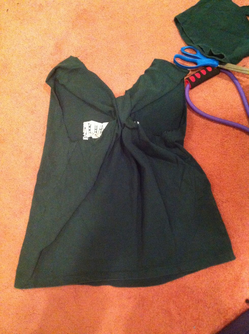 Bunch up the sleeves in the back together