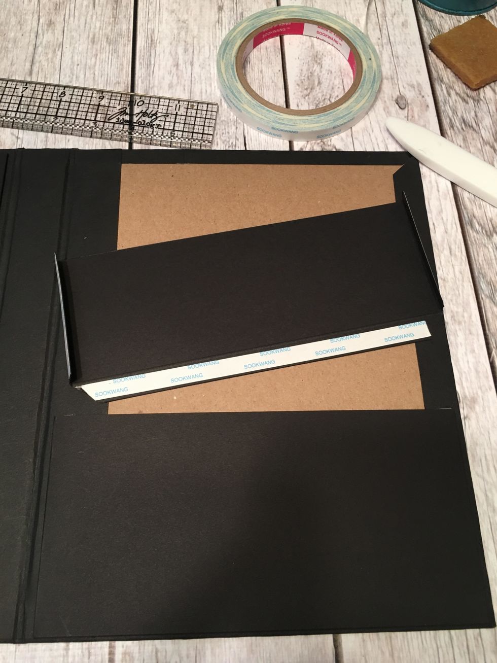 Burnish and fold the score lines all toward each other. apply 3/8" scor-tape to all three hinges.  (You can also use glue instead of tape).