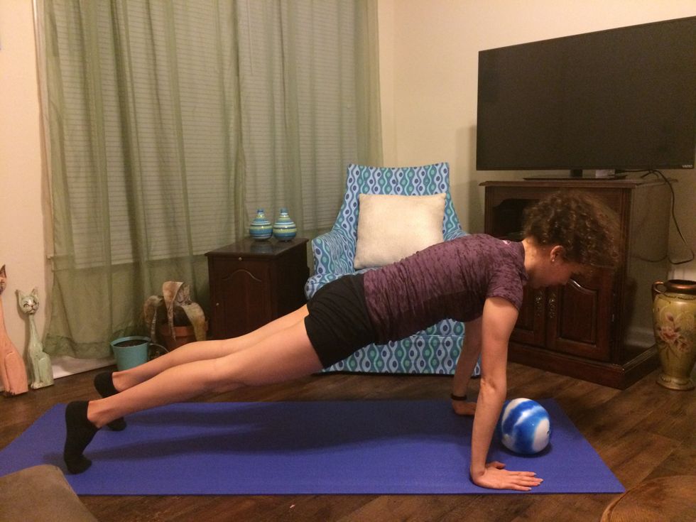 Burpees: Get in the plank position.