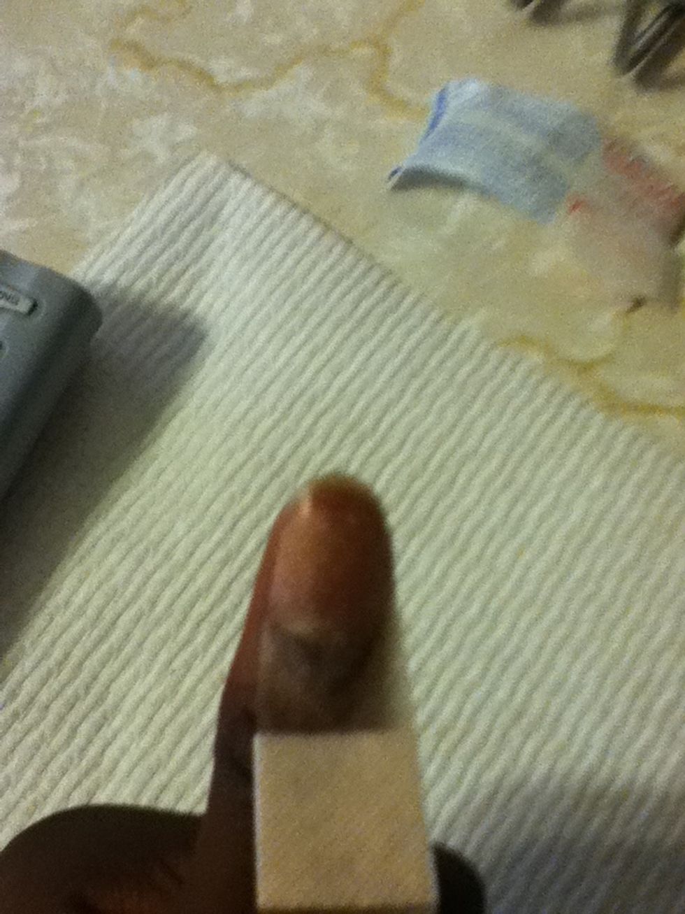 But if you don't have round small bandages then just use the tip of a regular bandage like shown above. Just place on fingernail but leave the tip uncovered.