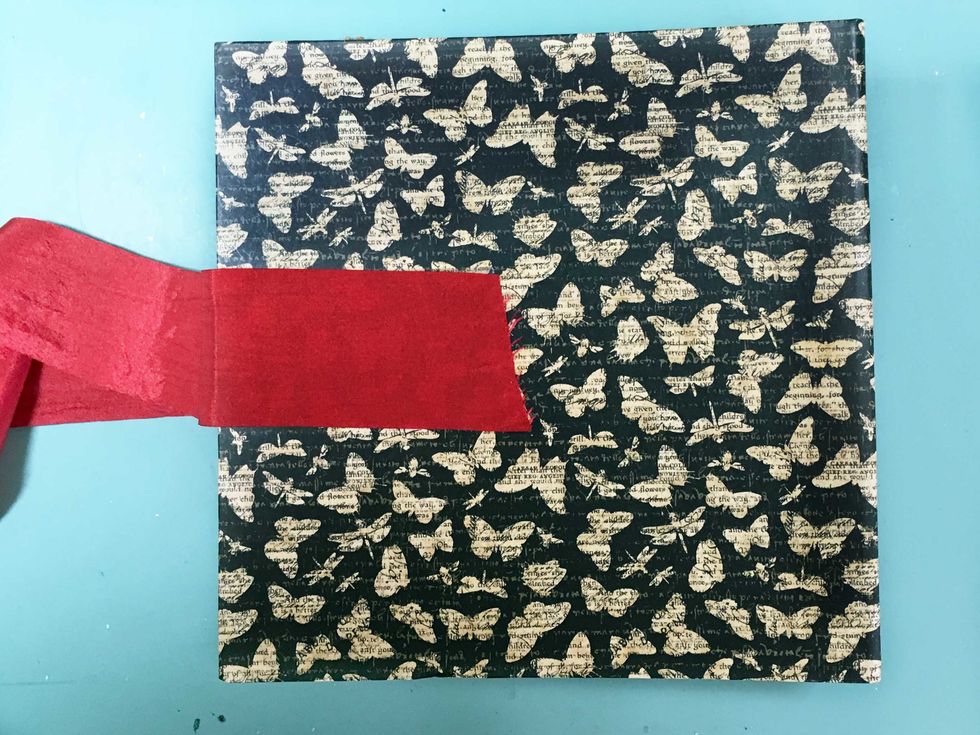 but no problem, since the ribbon will be covered. On the back I used scortape and that looks much nicer! I use Matte Medium to adhere all my pieces so that the cove is more durable and is protected.