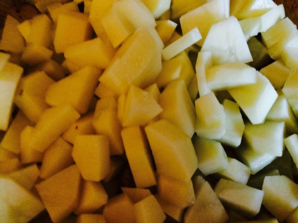 But this time I'm using potatoes. I'm chopping these up and in the pan to fry in some fat. I'm using olive oil.