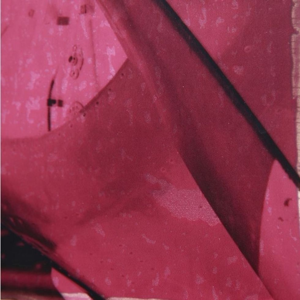 But when you expose the material in the sun, extra moisture causes condensation under your negative. This reflects sunlight & prevents it from penetrating the Inkodye and exposing the color fully.