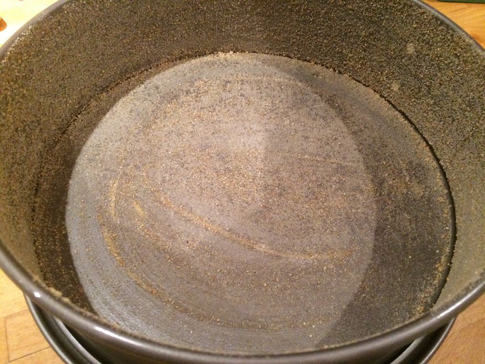 Butter and sprinkle bread crumbs in a springform. (Works fine without the bread crumbs)