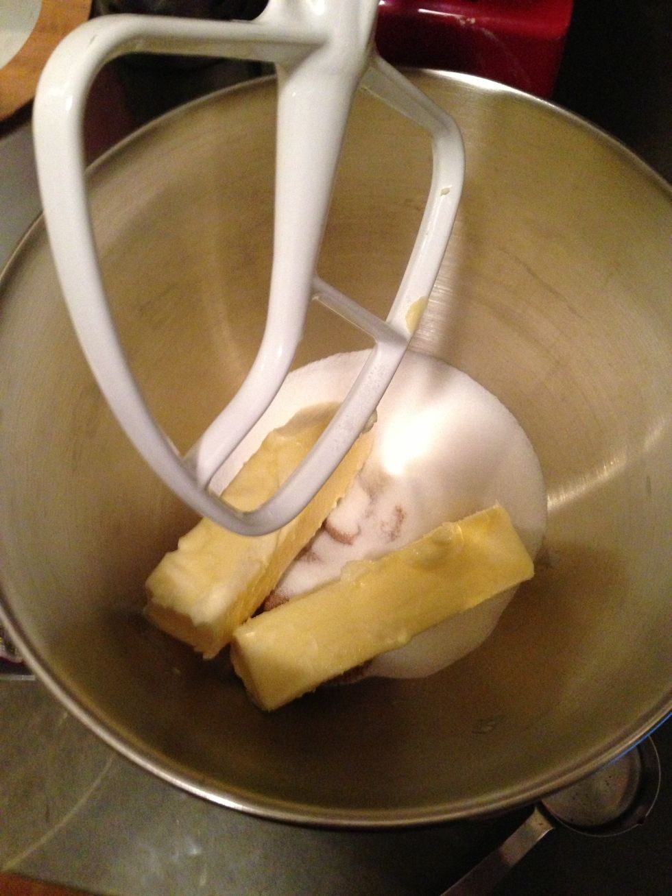 Butter and sugars in the mixer. Mix on high speed until light and fluffy.