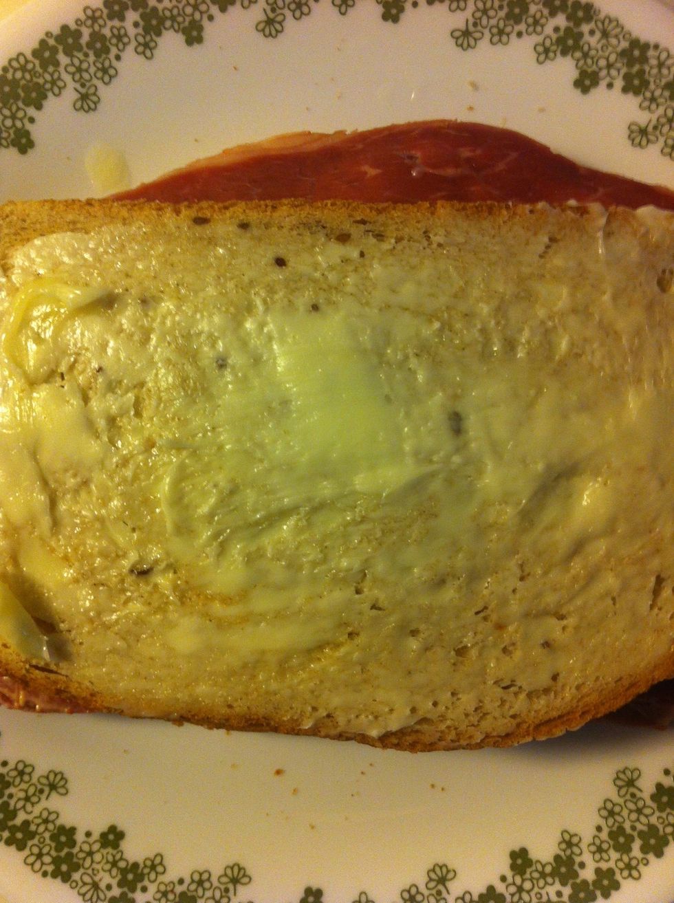 Butter both sides of sandwich