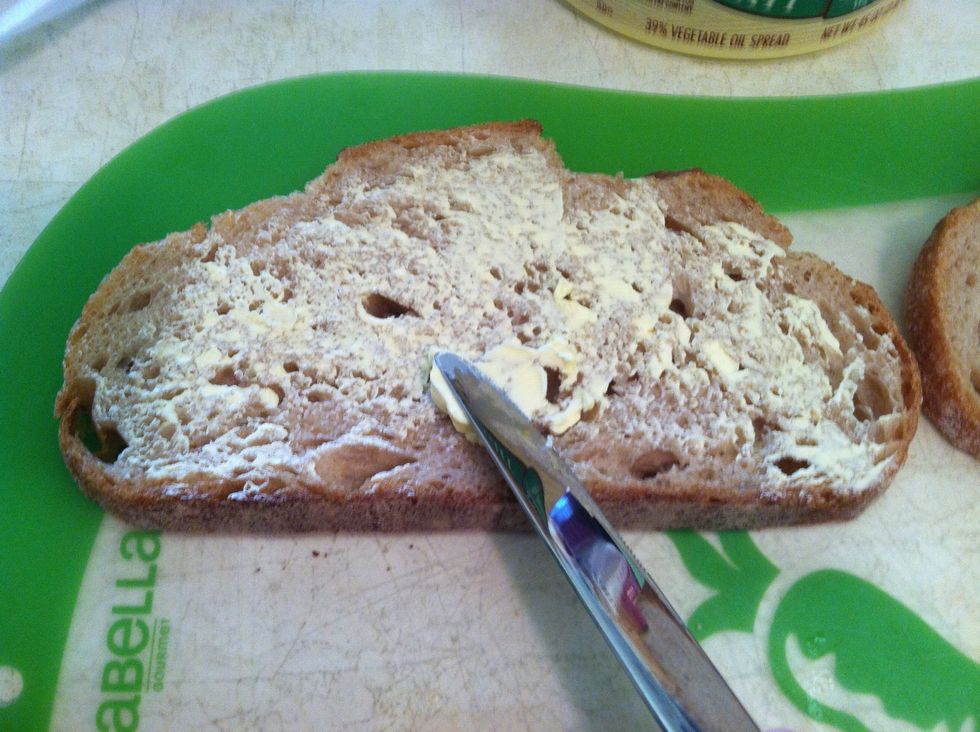 Butter one side of your bread. Both pieces of bread.