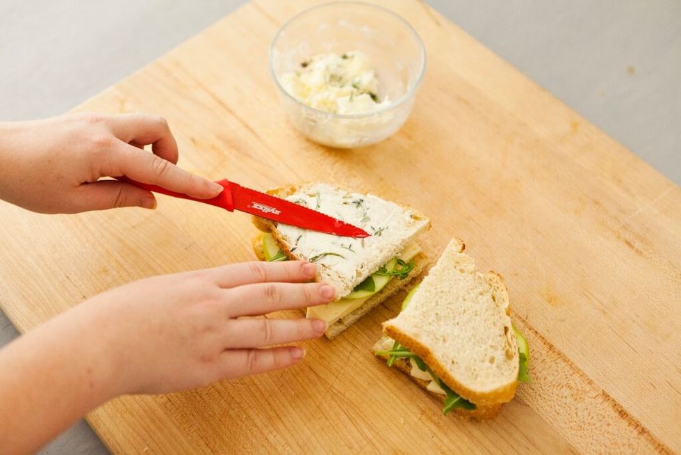 Butter the outside of one side of the sandwich with your herb butter mixture.
