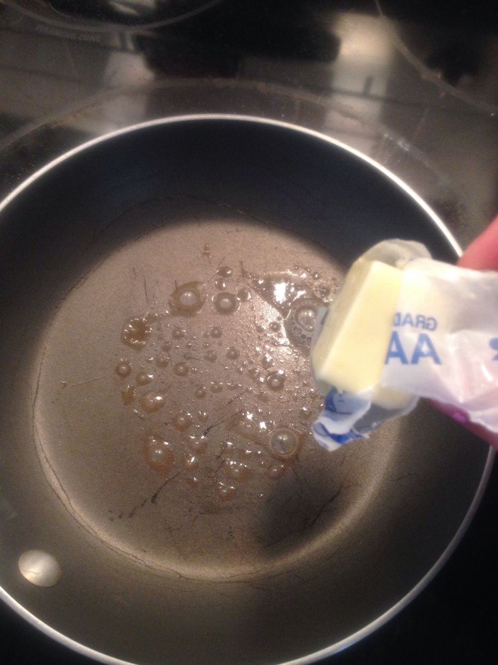 Butter the pan, it should sizzle because the pan will be very hot.