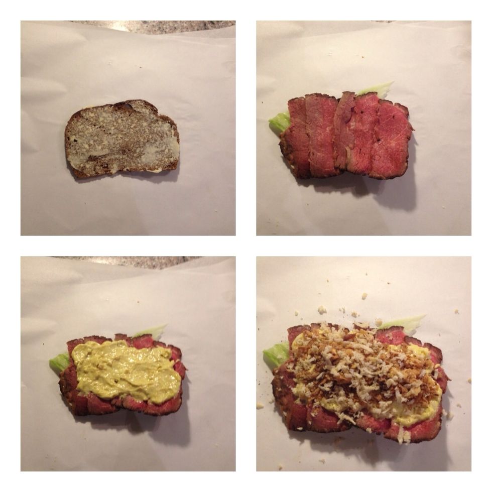 Butter the rye bread, use salad leaf under the meat to prevent the rye from getting soggy. Carve the meat as thin as possible. Add remoulade sauce , fried onions and finely grated horseradish.