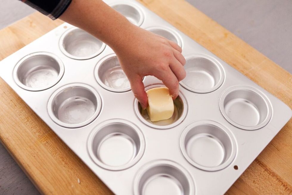 Butter your muffin pan liberally to make sure it doesn't stick.