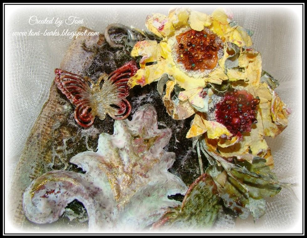 Butterflies were painted using Sorbets in Sunshine, Chocolate, Red Velvet, Coloration Spray in Peacock Feathers, and Velvet paint in Basil and Limeaid.