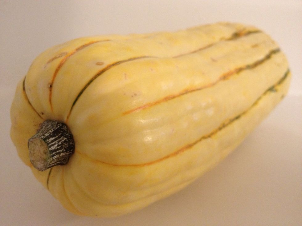 Buy a delicata squash. They are rich in potassium, iron, and vitamins A & C. Found late summer to fall.