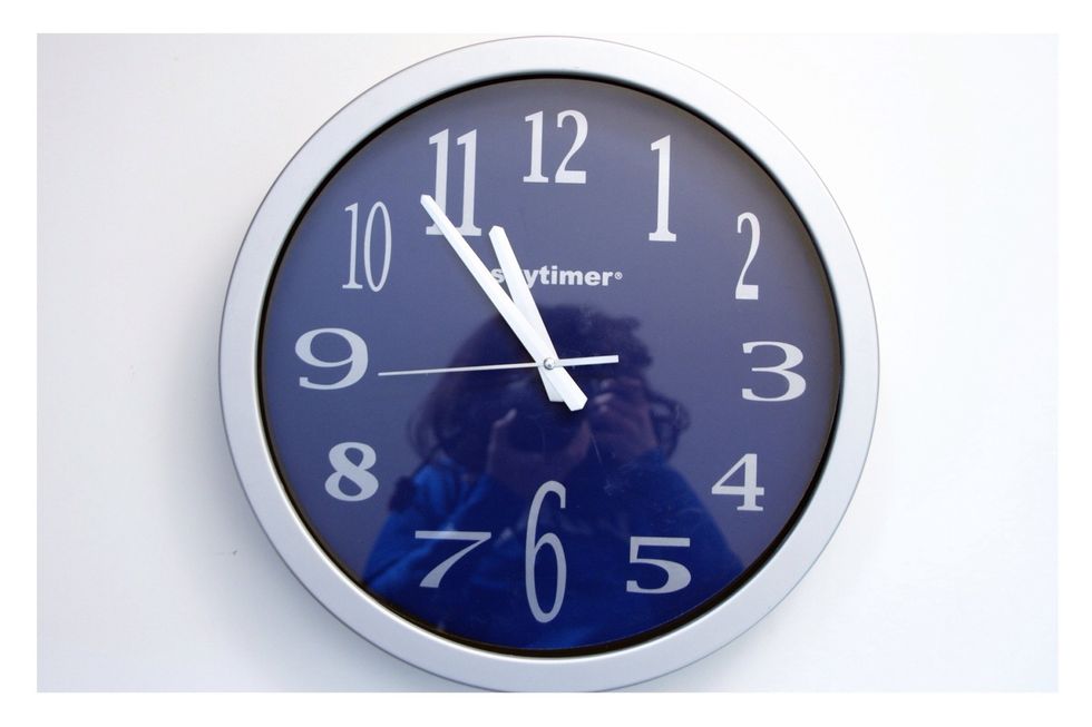 Buy an inexpensive round clock with a simple frame.