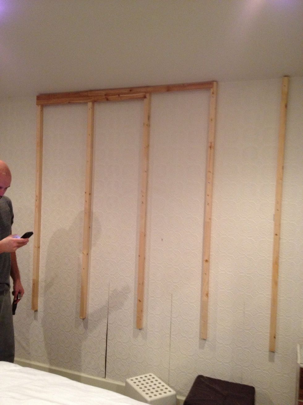 Buy cedar lath strips, these are around 10 bucks per pack, we bought 6. We cut them so they would be varied lengths for installation. We wanted them to show the texture and color of natural cedar.