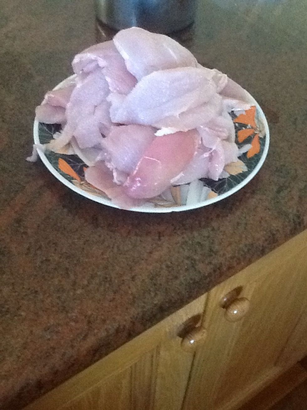 Buy chicken fillets pre-chopped and place them in bowl