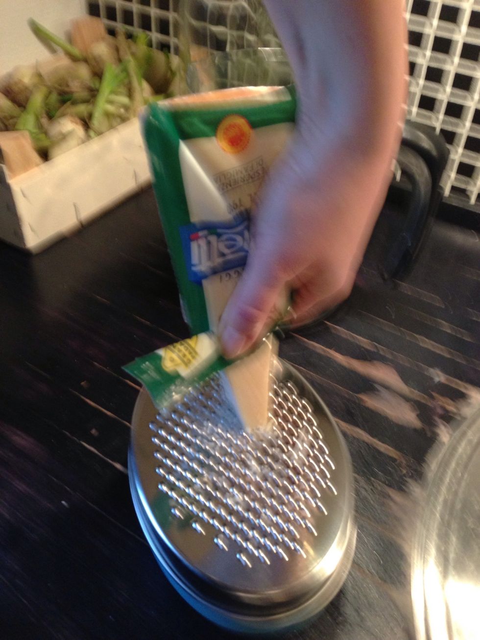 Buy grated parmesan or get the better result by doing it yourself