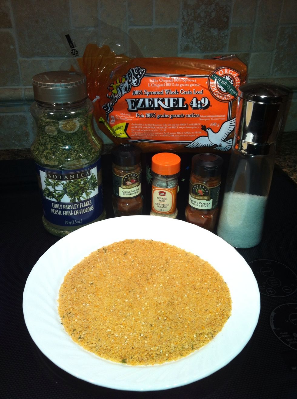 Buy or make your own finely crushed breadcrumbs. Mix in dry parsley, paprika, sesame, salt, pepper (or chili). Taste the mix and adjust the spices to your liking. experiment with additional spices.