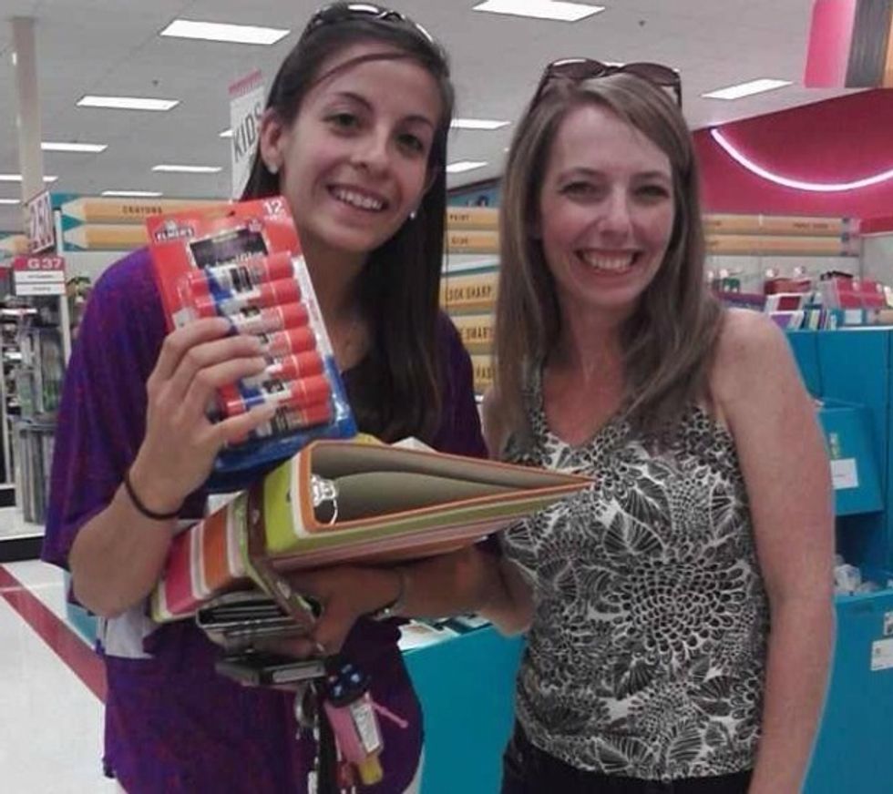 Buy school supplies for a new teacher. Or, in this case, give a new teacher the last value pack of glue sticks that you had hidden in your cart.