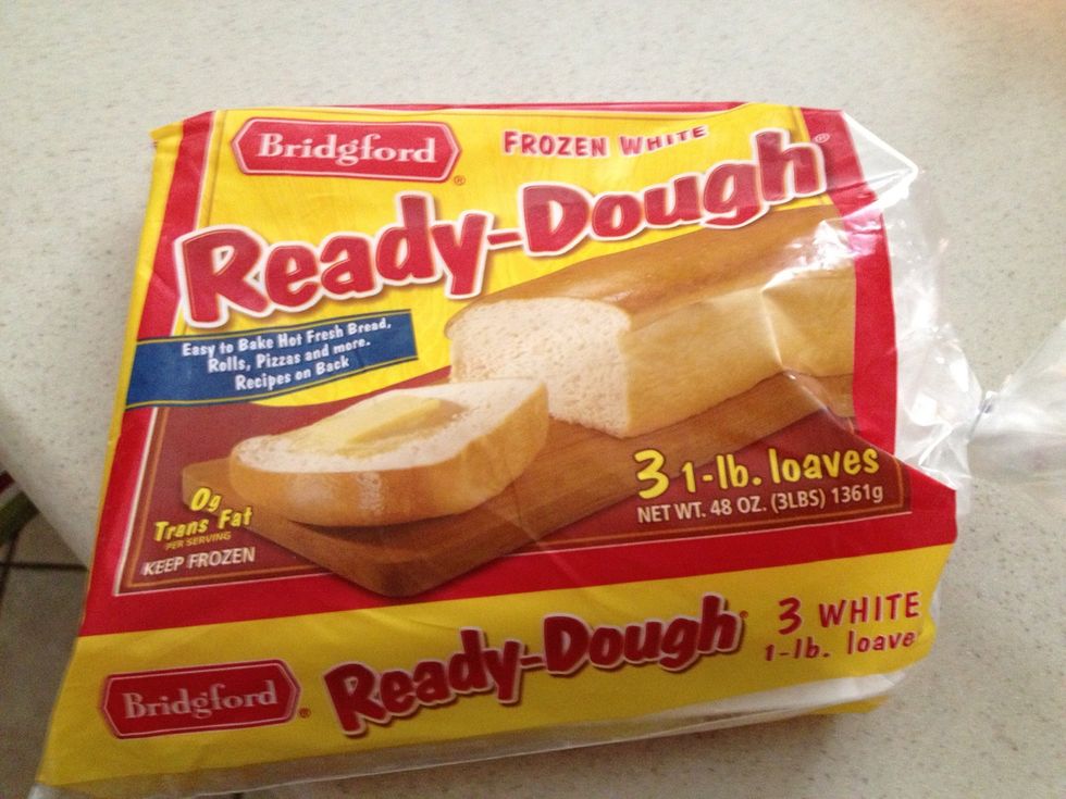 Buy some frozen dough from the freezer section of your local grocery store