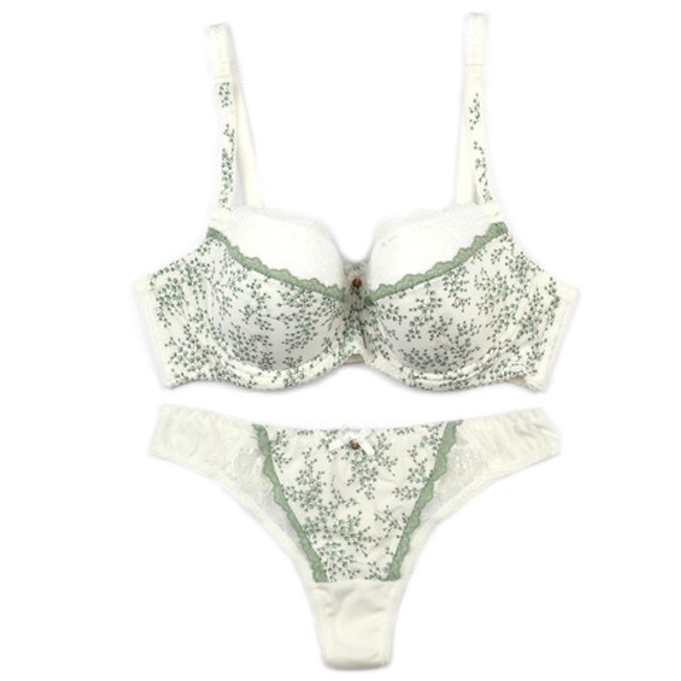 Buy the right size. No, put the measuring tape away. Just find a bra that your wife loves and write the size down.