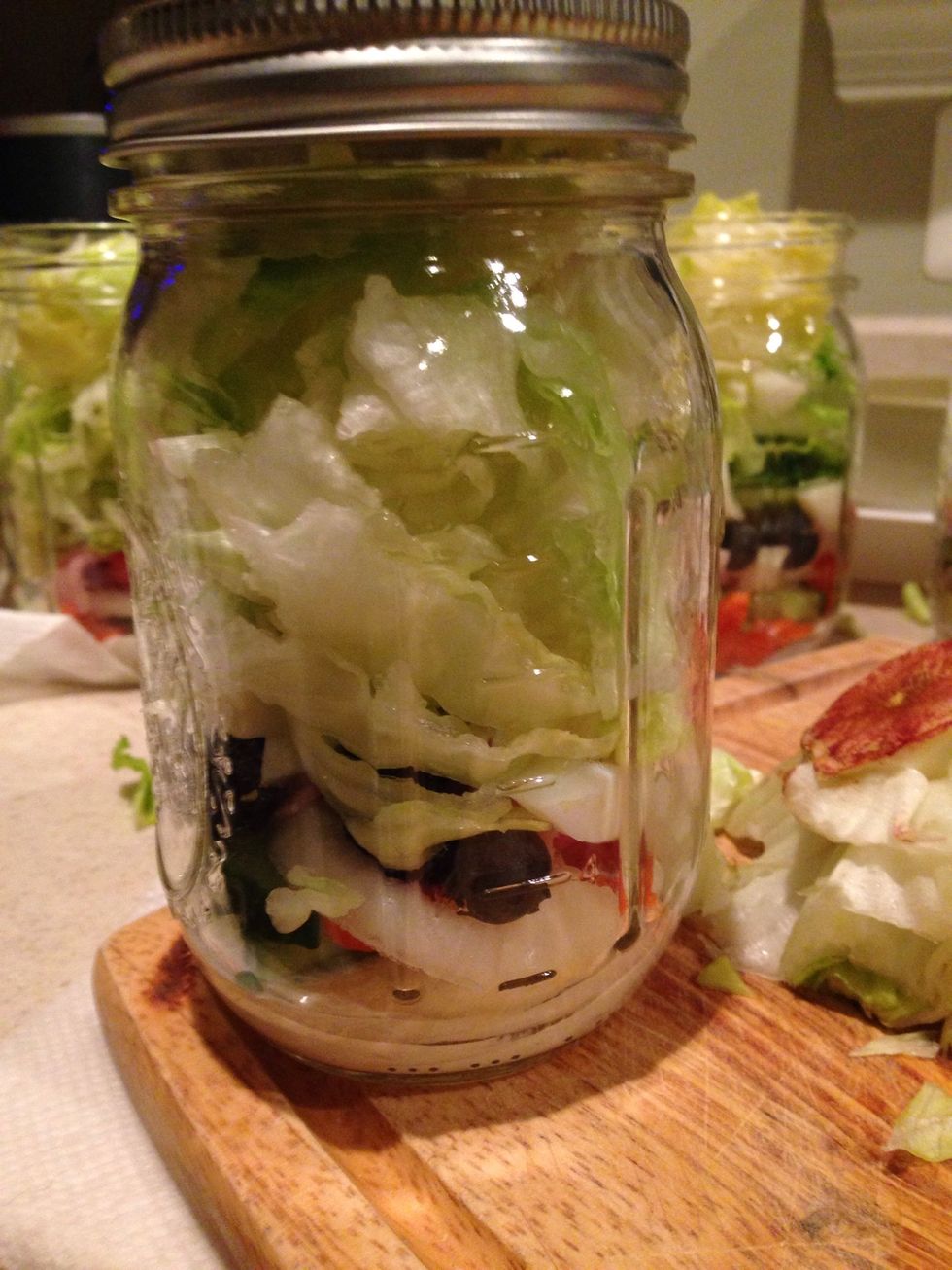 By adding the dressing at the bottom, it allows everything else to be fresh up to 1 week without soggy salad.