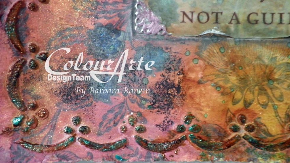 By adding these colors to the border, I not only made it look like it belongs with the clock, but also carried out that color once again.