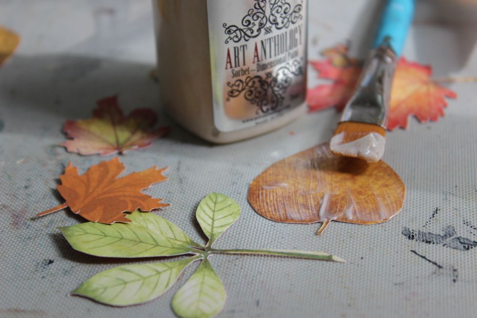 By doing this it will not only make the leaves stiffer and easier to use but it adds a beautiful glimmer to them.
