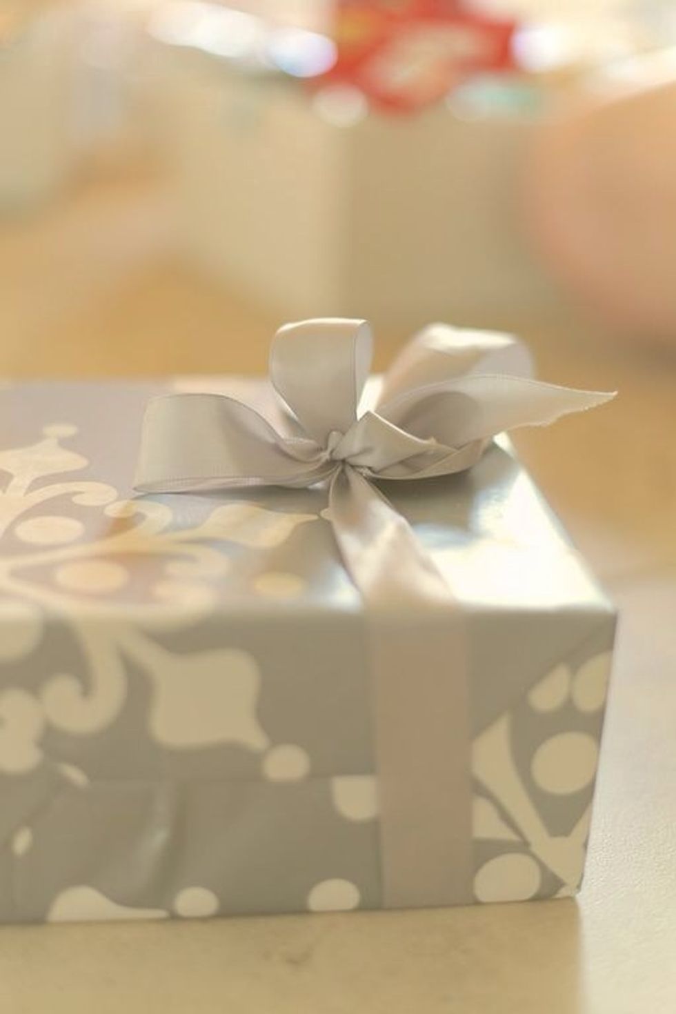 By now your bow should look pretty awful with two huge ears and tiny clumped loops. Time to fix it!