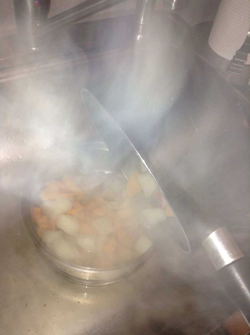 By now your potatoes should be finished so strain them into a colander