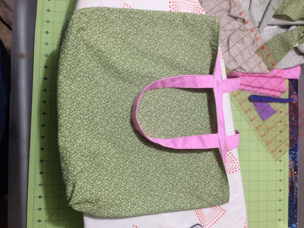 By sewing a narrow seam around the top of the bag you close the gap as well as create a finished looking edge. Press the bag.