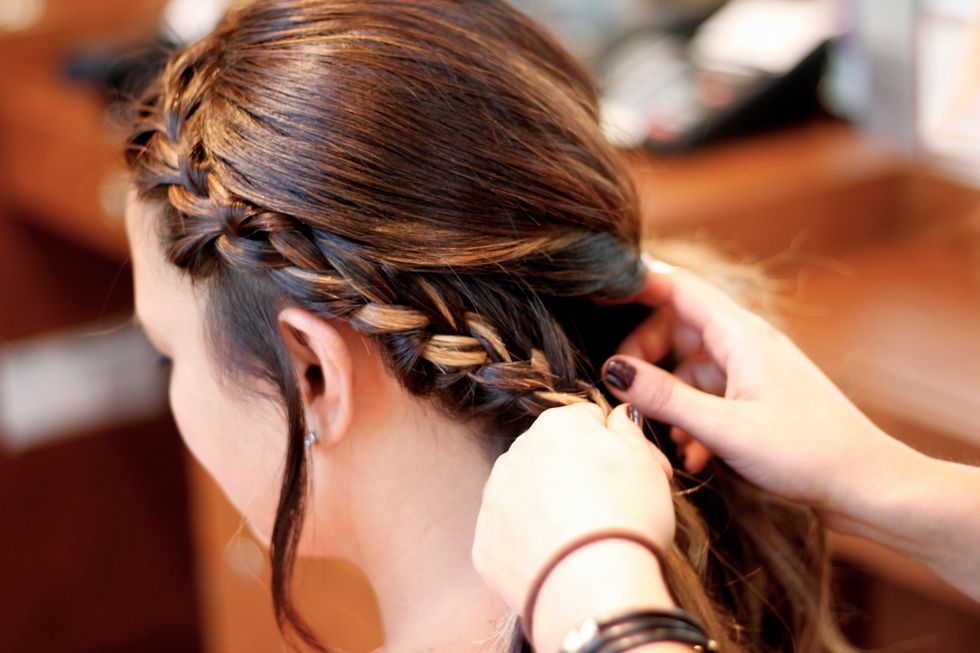 By the nape of the neck, stop Frenching and continue to in a simple braid for the rest of the length of your hair.