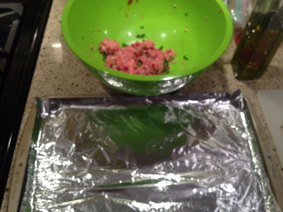 By the way, I used olive oil on the pans. All of the meatballs went in a 350 degree Fahrenheit oven until cooked through.