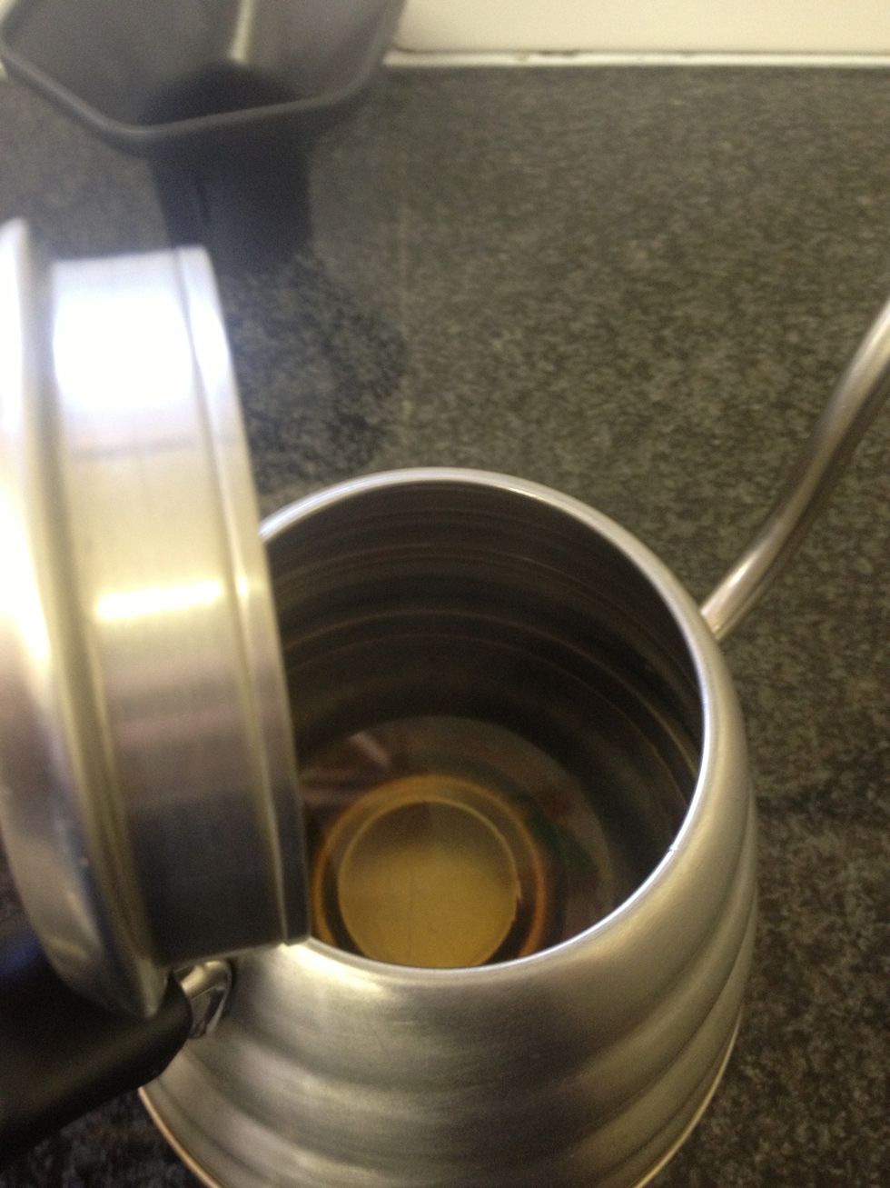 By this time, your boiled water should have cooled sufficiently. I usually use water that has cooled to around the 90 deg Celcius mark