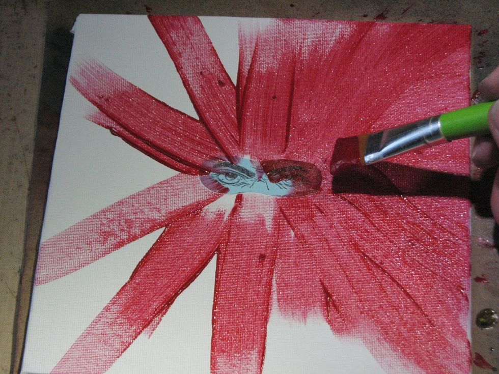 By working the paint from the center outward the brush strokes will radiate from the eyes adding to the spooky effect.