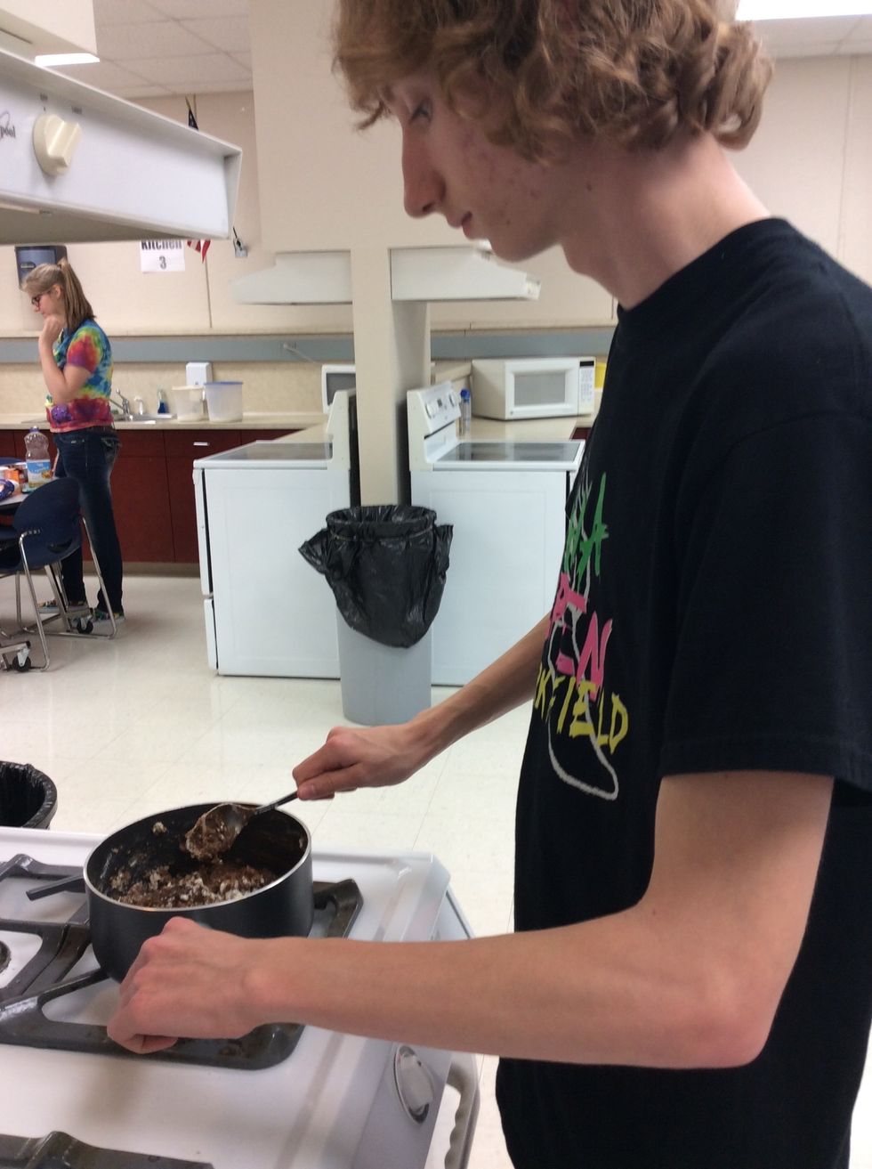 Cake- In large saucepan bring water and cocoa to a boil. Remove from heat.