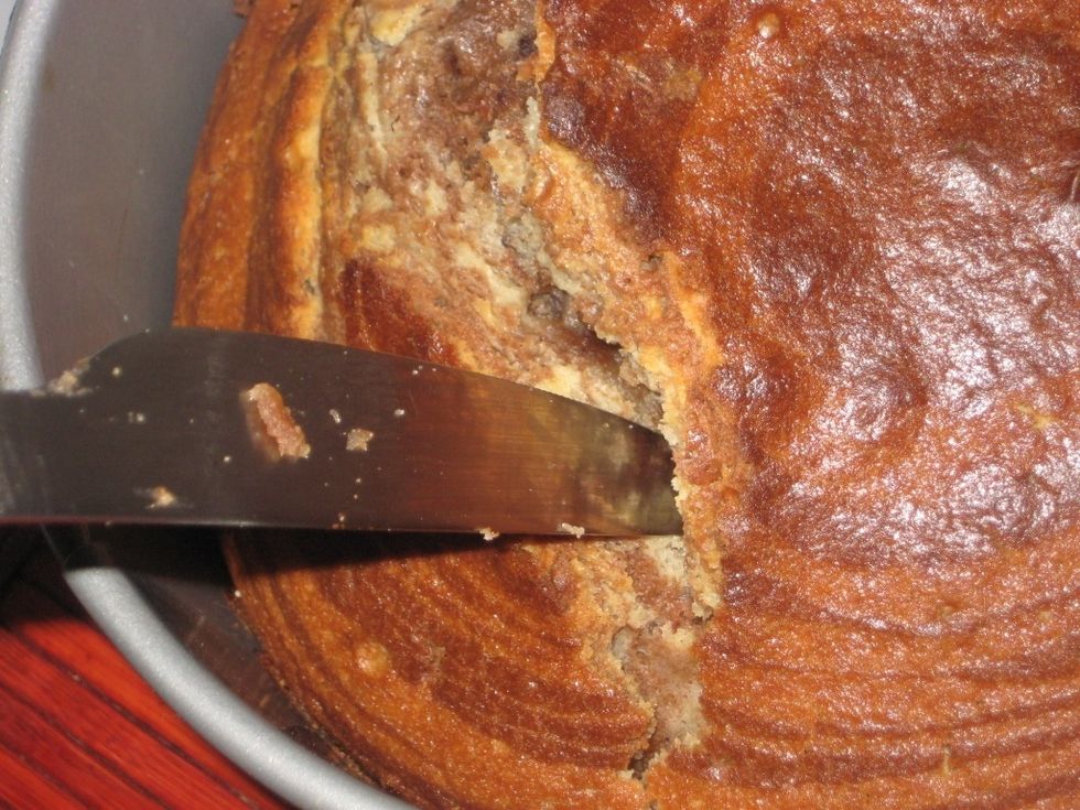 Cake is ready when a small knife comes out clean and dry.